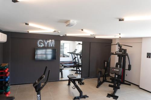 a gym with treadmills and exercise equipment in a room at ibis Arcoverde in Arcoverde