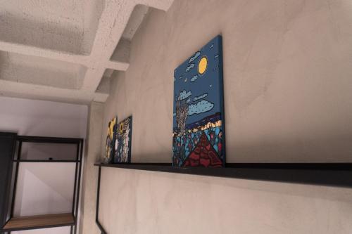 a painting on the wall of a room at ibis Arcoverde in Arcoverde