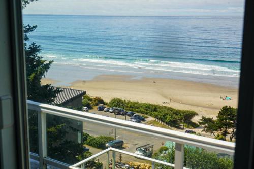 a view of a beach from a balcony at Berni's Ocean View Castle - The Potter's Wheel in Oceanside