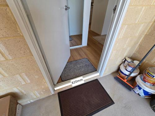 a room with a door with a sign that reads sparrow at Urban Virgo Escape in Caversham