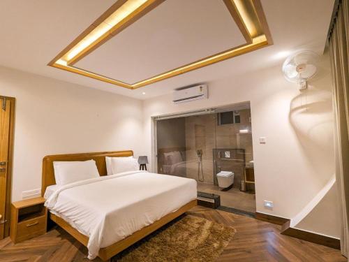 Letto o letti in una camera di Talenresort Vythiri Villas