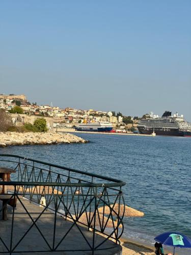a view of a body of water with a city at Lara3 in Kavala