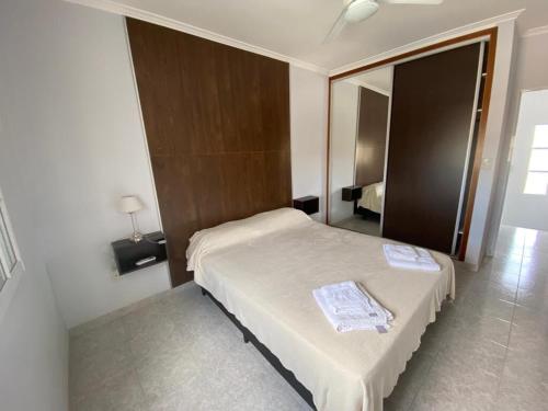 Ένα ή περισσότερα κρεβάτια σε δωμάτιο στο Duplex apartment for 5 people