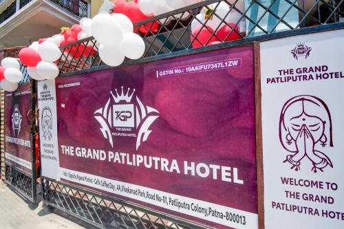 a store shelf with signs for the grand pittpirula hotel at Hotel O The Grand Patliputra in Patna
