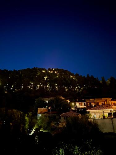 a view of a mountain at night at Olivia 42 in Nafpaktos