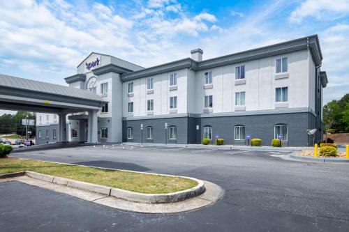 a rendering of a hotel with a parking lot at Spark by Hilton Commerce, GA in Commerce