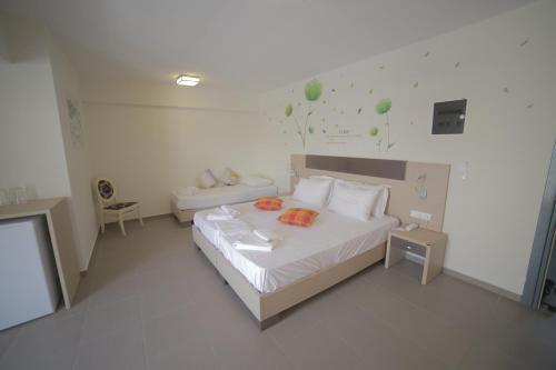 パラリア・カテリニスにあるEco Paraliaのベッドルーム1室(枕2つ付)