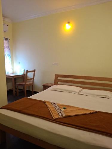Postel nebo postele na pokoji v ubytování Iris Homestay Goa