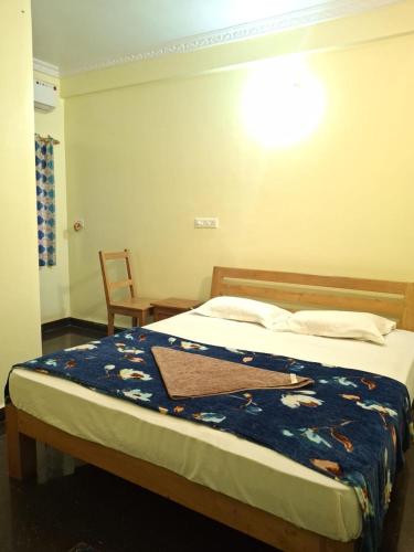 Postel nebo postele na pokoji v ubytování Iris Homestay Goa