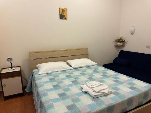 Ένα ή περισσότερα κρεβάτια σε δωμάτιο στο Casa per Ferie Eden Cusmano