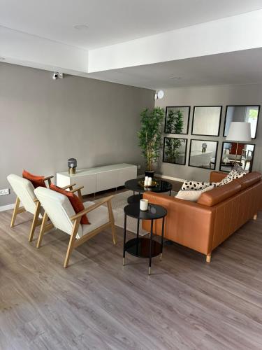 a living room with a couch and a table at Vera Cruz Guesthouse in Angra do Heroísmo