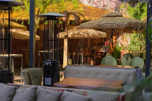 Glam Taoo Hotel Apartamento Boutiqueにあるレストランまたは飲食店
