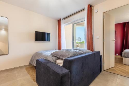 Postel nebo postele na pokoji v ubytování Apollonia Visage du Monde - Clim - Parking - Tram à 2min