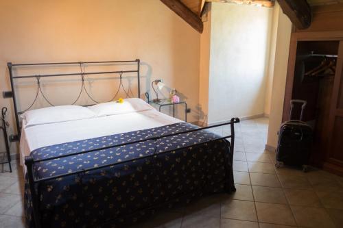 Postel nebo postele na pokoji v ubytování Hotel Le Botti