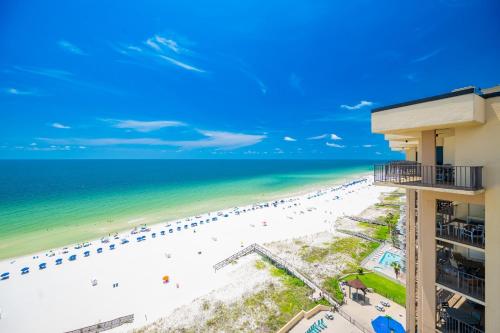 a view of the beach from the balcony of a resort at Phoenix II 2151 condo in Romar Beach