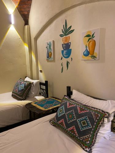 Ένα ή περισσότερα κρεβάτια σε δωμάτιο στο Bahariya Oasis hotel
