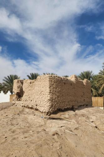 a building sitting on top of a pile of dirt at Casa Blanca - calm space for soul revival in Ādam