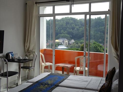 Posezení v ubytování Kandy Supreme Hotel