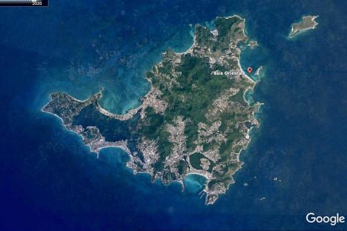a satellite image of an island in the water at Villa Redfish in Orient Bay