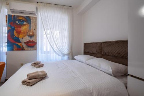 Apartman Ksenijaにあるベッド