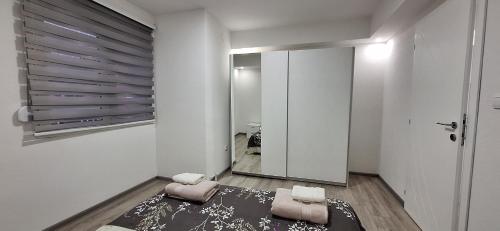 Ένα ή περισσότερα κρεβάτια σε δωμάτιο στο Soko apartments