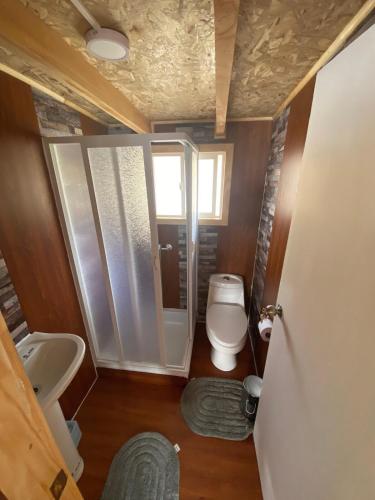 Ванная комната в Cabaña con vista al lago