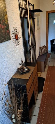 a living room with a sink and a mirror at Fewo Steinbeisser in Arrach