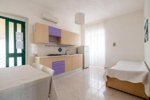 Postel nebo postele na pokoji v ubytování Liberato Puglia Vacanze