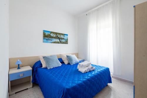 Postel nebo postele na pokoji v ubytování Liberato Puglia Vacanze