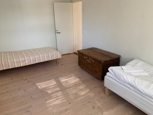 Cama ou camas em um quarto em Sjösidan