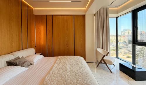 Ένα ή περισσότερα κρεβάτια σε δωμάτιο στο Urban Elegance Apartment