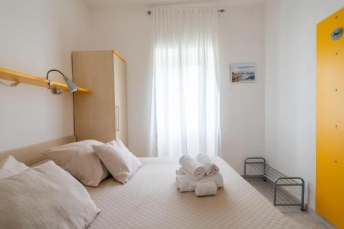 Postel nebo postele na pokoji v ubytování Liberato Puglia Vacanze