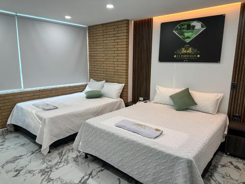 Postel nebo postele na pokoji v ubytování Hotel La Esmeralda Doradal