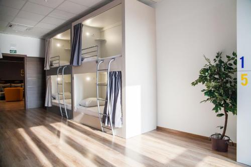 a bedroom with bunk beds in a room at En Route Hostel in Split