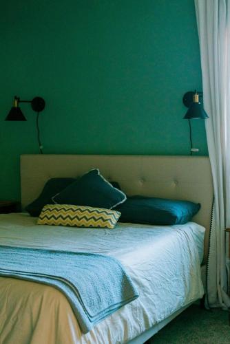 Ένα ή περισσότερα κρεβάτια σε δωμάτιο στο Gorgeous 4BR Home Massive Modern Home