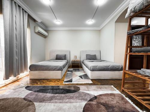 Ένα ή περισσότερα κρεβάτια σε δωμάτιο στο Modern Cozy Studio Prime Location In Maadi
