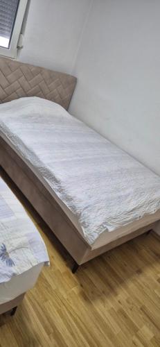Postel nebo postele na pokoji v ubytování Apartman- Sarajevo