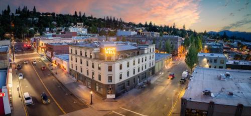 an aerial view of a city with a white building at Lightwell Hotel & Spa in Hood River