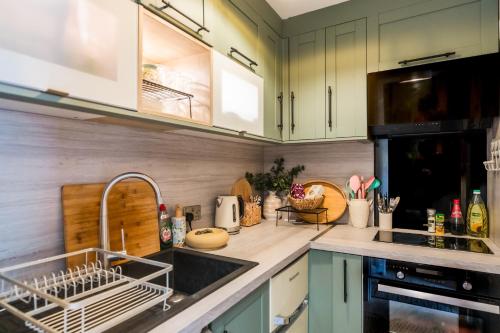 Η κουζίνα ή μικρή κουζίνα στο Relaxing Studio l Town Centre