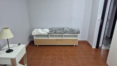 Ένα ή περισσότερα κρεβάτια σε δωμάτιο στο FDH Apart