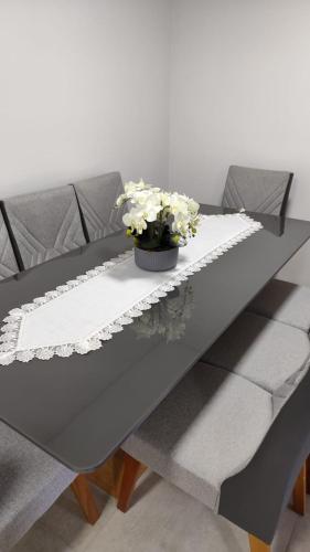 Ruang duduk di Excepcional Apartamento em Piratuba - SC
