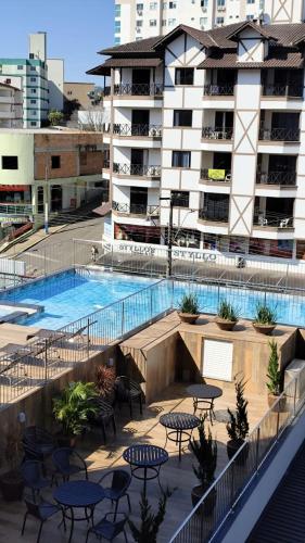Kolam renang di atau dekat dengan Excepcional Apartamento em Piratuba - SC
