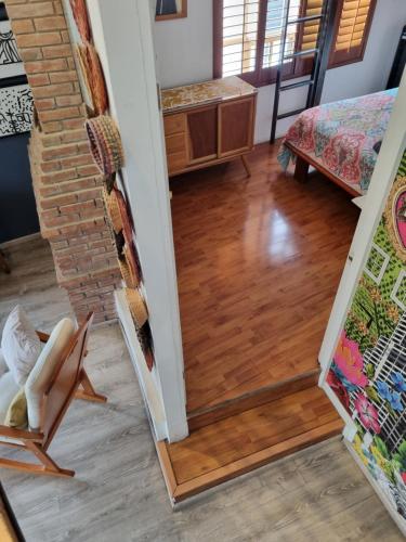 a view of a living room with a mirror at el nido! Private stay at nice apartment North blvd Saltillo Mexico in Saltillo