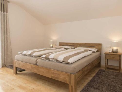 Katil atau katil-katil dalam bilik di Holiday home with 4 bedrooms