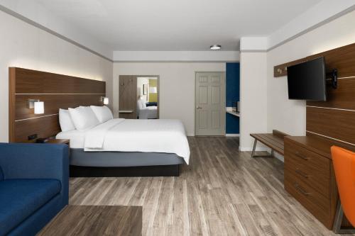 a hotel room with a bed and a tv at Holiday Inn Express Hotel & Suites San Dimas by IHG in San Dimas