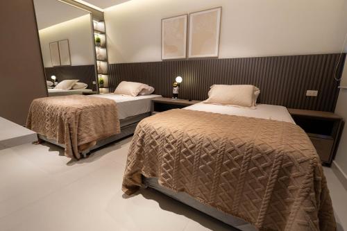 Ein Bett oder Betten in einem Zimmer der Unterkunft VIVE CDE con Estilo - Casa Premium