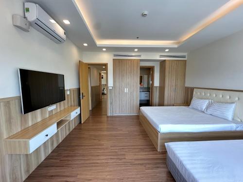 Televisyen dan/atau pusat hiburan di FLC Three Bedroom Apartment Quy Nhon