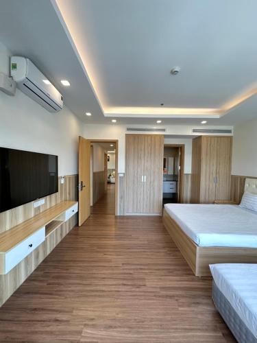 Katil atau katil-katil dalam bilik di FLC Three Bedroom Apartment Quy Nhon