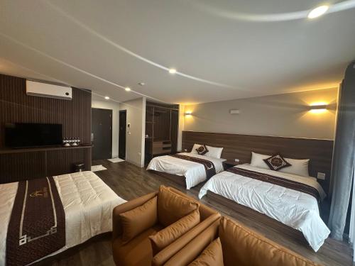 Ένα ή περισσότερα κρεβάτια σε δωμάτιο στο Aurora Đồng Văn Boutique Hotel