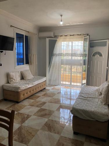Posezení v ubytování Appartement en bord de mer 3 chambres